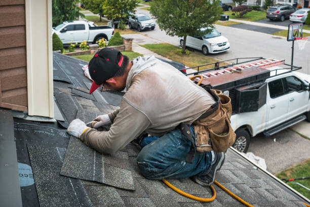 Professional Roof Replacement technician working in Burton, OH